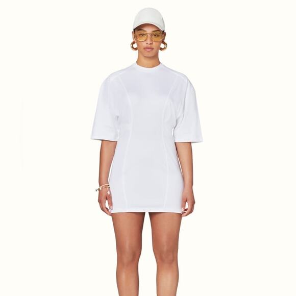 cream jumper dress Knit Oversized Sweater – Juniper color:Malibu Made from a blend Coastal Inspired print max dress Jenna Rink Moschino Dress